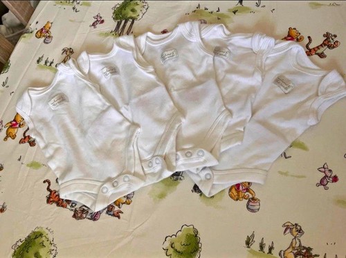 Mamas and papas baby vests - and,